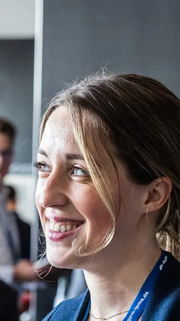Two women talking at an event