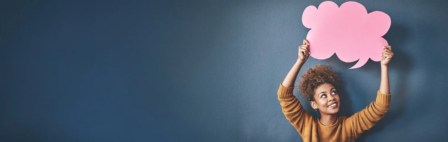 Woman holds up thought bubble